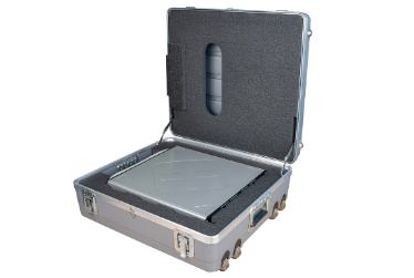 A silver case with a rectangular object in it

Description automatically generated